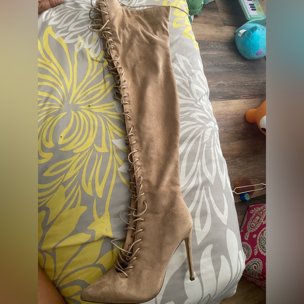 Thigh high stiletto boots